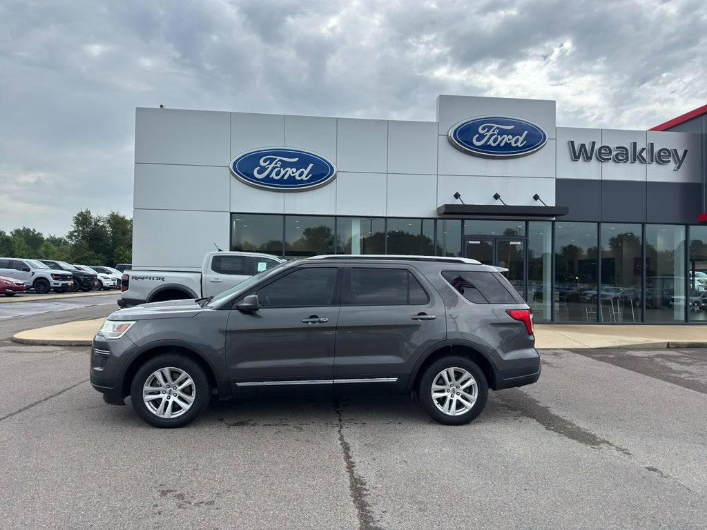 2018 Ford Explorer XLT in Magnetic Metallic — front three-quarter view