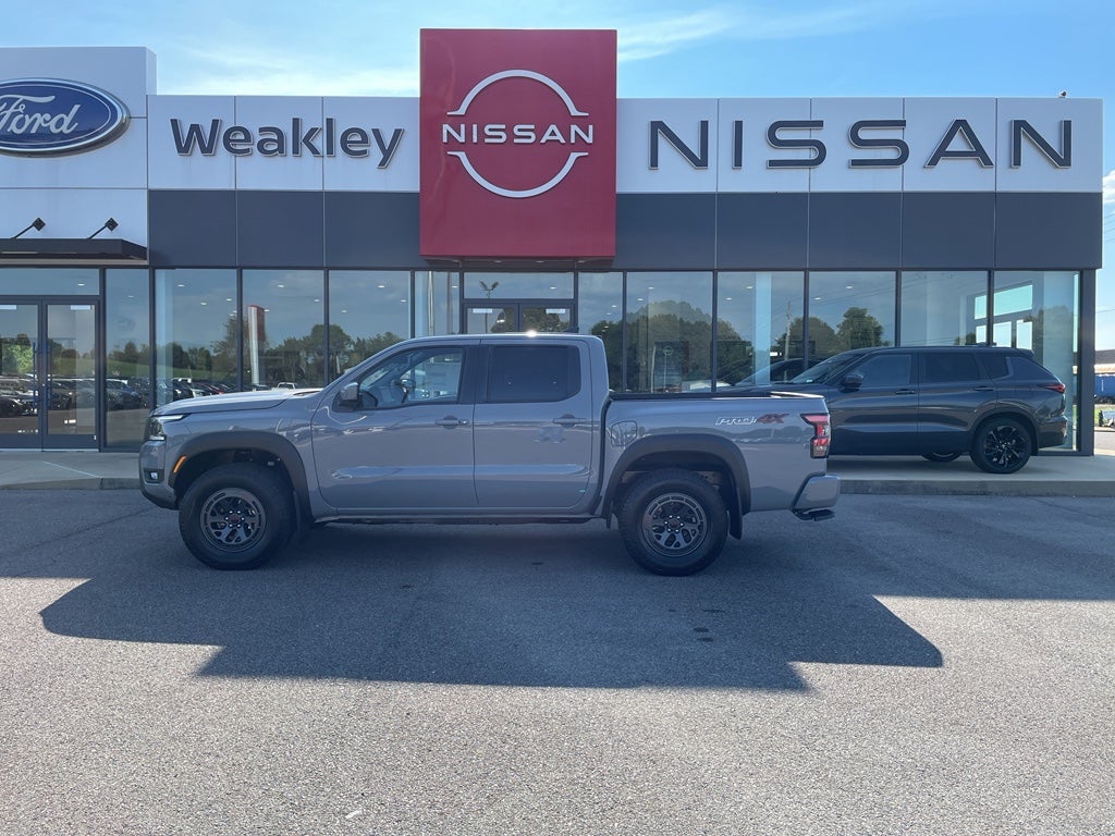 2026 Nissan Frontier PRO-4X in Boulder Gray Pearl — front three-quarter view