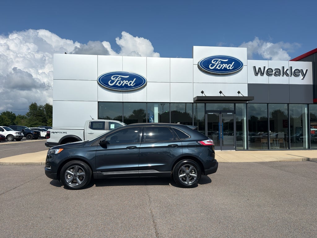 2023 Ford Edge SEL in Stone Blue Metallic — front three-quarter view