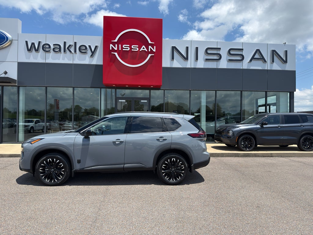 2026 Nissan Rogue Dark Armor in Boulder Gray Pearl — front three-quarter view