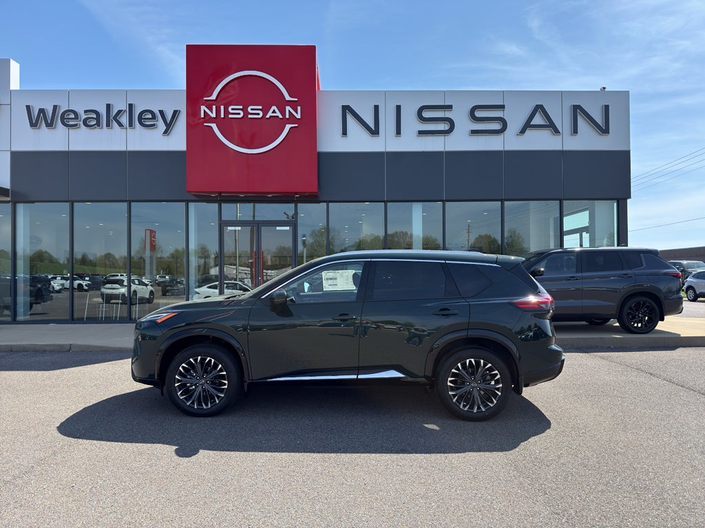 2026 Nissan Rogue Platinum in Obsidian Green — front three-quarter view